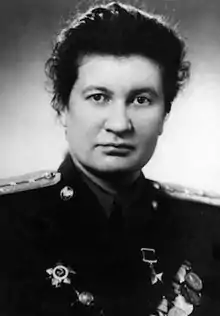 Portrait photograph of Raisa Aronova in uniform from after the war