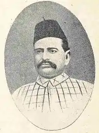 A mustachioed Ratan Nath Dhar Sarshar, wearing a fez