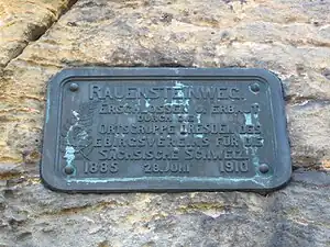 Plaque on the construction of the Rauenstein trail