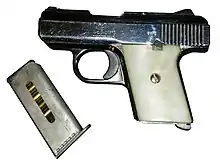 Raven MP-25 .25 ACP chrome with faux mother of pearl grips and push up safety
