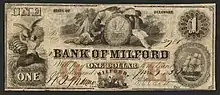 Bank of Milford 1 dollar banknote. Illustrations include Liberty feeding an eagle from a goblet, a Native American male with tipis, a sailor with telescope, a shield with grain and a bull, and a shipbuilding scene. Inscription: "STATE OF DELAWARE THE BANK OF MILFORD Will pay ONE DOLLAR to the bearer on demand. MILFORD".