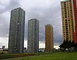 During the mid-20th century, Britain saw the construction of hundreds of tower blocks—particularly in largest cities—to replace Victorian era slums. This image shows Red Road in Glasgow.