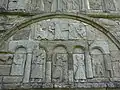 Carvings on the arcade: At top is the Judgement of Solomon, at bottom the Adoration of the Magi
