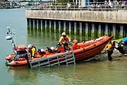 Rennee Sherman (B-891) being launched in a cradle in the river Arun, Littlehampton Lifeboat Station, 9 May 2016.