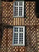 Windows of the Hôtel Racape de La Feuillée at Place des Lices