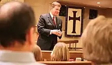 Moore preaching in 2008.