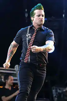 Tré Cool performing with Green Day in 2013