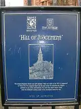 The historical plaque for the old judgement hill at Riccarton.