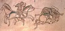 Parchment drawing of two chain-mail clad men fighting on horseback where the one on the left is spearing the other.