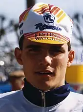 Portrait of Richard Virenque wearing a white, red and yellow cap