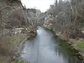 River leading from the waterfall