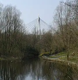 Pond and cable stayed road bridge over Riverside Park, Glenrothes