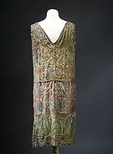 Egyptian influences - Dress decorated with lotus flower that are inspired by those found in Ancient Egyptian decoration, by Jenny (couturier) and Lesage (embroiderer), silk, metallic thread, and crocheted embroidery, Musée Galliera, Paris