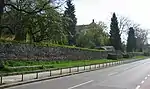 Reconstructed Roman walls along a road