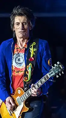 Wood on stage with The Rolling Stones in 2018