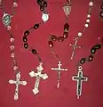 Various rosaries with Crucifixes