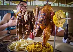 Rotisserie chicken, twice-fried plantain in Ciales, Puerto Rico