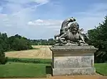 Statue of Lion and Horse about 85m north of Rousham Park and at north end of bowling green
