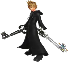 The image shows a young kid with blond hair and blue eyes, who wears a black cloak and wields two key-shaped weapons.