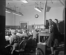 WAAF teleprinter operators at work in the signals centre at RAF Pitreavie Castle during the Second World War.