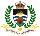 The emblem of the Royal Police Force of Antigua and Barbuda featuring the Crown