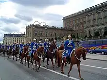 Mounted Royal Guards in front of the palace
