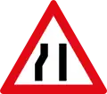 Road narrows on left side