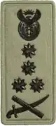 General embossed badge Left