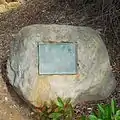 Historic plaque documenting the 1827 grist mill