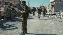 SDF fighters in Raqqa's downtown, 12 July