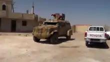 SDF MRAP and pickup truck in Raqqa, 8 June 2017