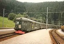 ABe 4/4 (formerly CFZe 4/4) motor coach with coaches at Biberbrugg station