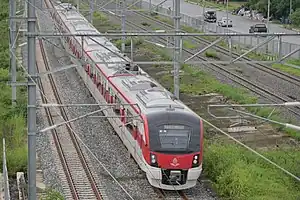 SRT Light Red Line commuter train at Lak Hok station
