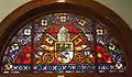 Pontifical Window with the coat of arms of Pope Benedict XV during whose reign the cathedral was dedicated