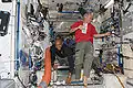 Satcher and Leland Melvin floating inside Node 2. Jeff Williams is enjoying a water drink.