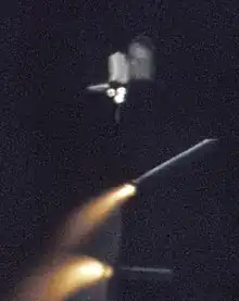 The SRBs separating during the ascent of the Space Shuttle during STS-1