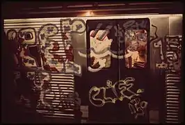 Rampant graffiti hampers visibility into and out of subway cars (1973).
