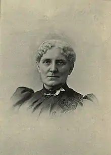 sepia portrait photograph of white-haired woman