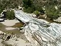 Sabino Creek passing over striated rock formation