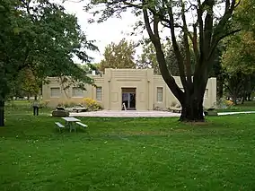 A museum building surrounded by trees