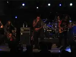 From left to right: Andy, Trevor, Alessio, Tommy performing live in 2008
