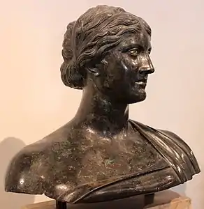 Female torso with himation found in the rectangular peristyle identified as a poetess possibly Sappho after original by Silanion in 350 BCE