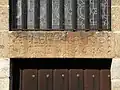 Lintel above the entrance door of the Old Church.