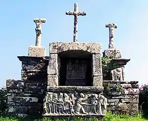 The Calvaire de Kerbreudeur. As can be seen the calvary is constructed in such a way as to create a niche in the centre and within this niche is a depiction of the resurrection and other scenes