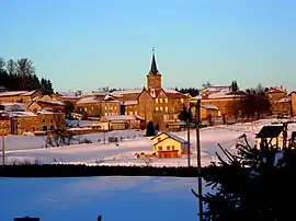 The church and surrounding buildings in winter