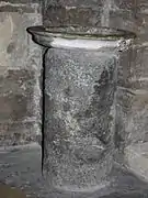 Holy water font carved in an old capital