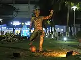Statue of a player near the main gate of VYBK