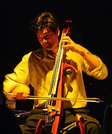 Sam Davol playing with The Magnetic Fields in 2001