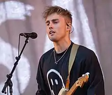 Fender performing in 2021