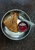 Samosa with sauce available at Indian coffee houses in Kerala